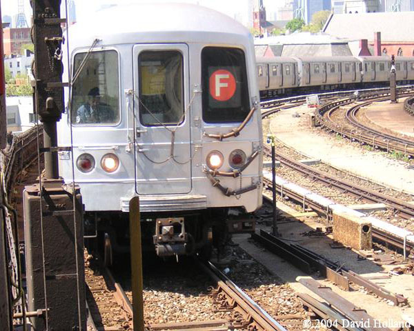 Coney Island/Stillwell Ave. bound F train entering the Smith-9th Sts. station on the F & G