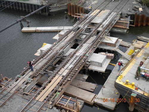 Installing pre-cast abutments at the Hog Island Channel Bridge.